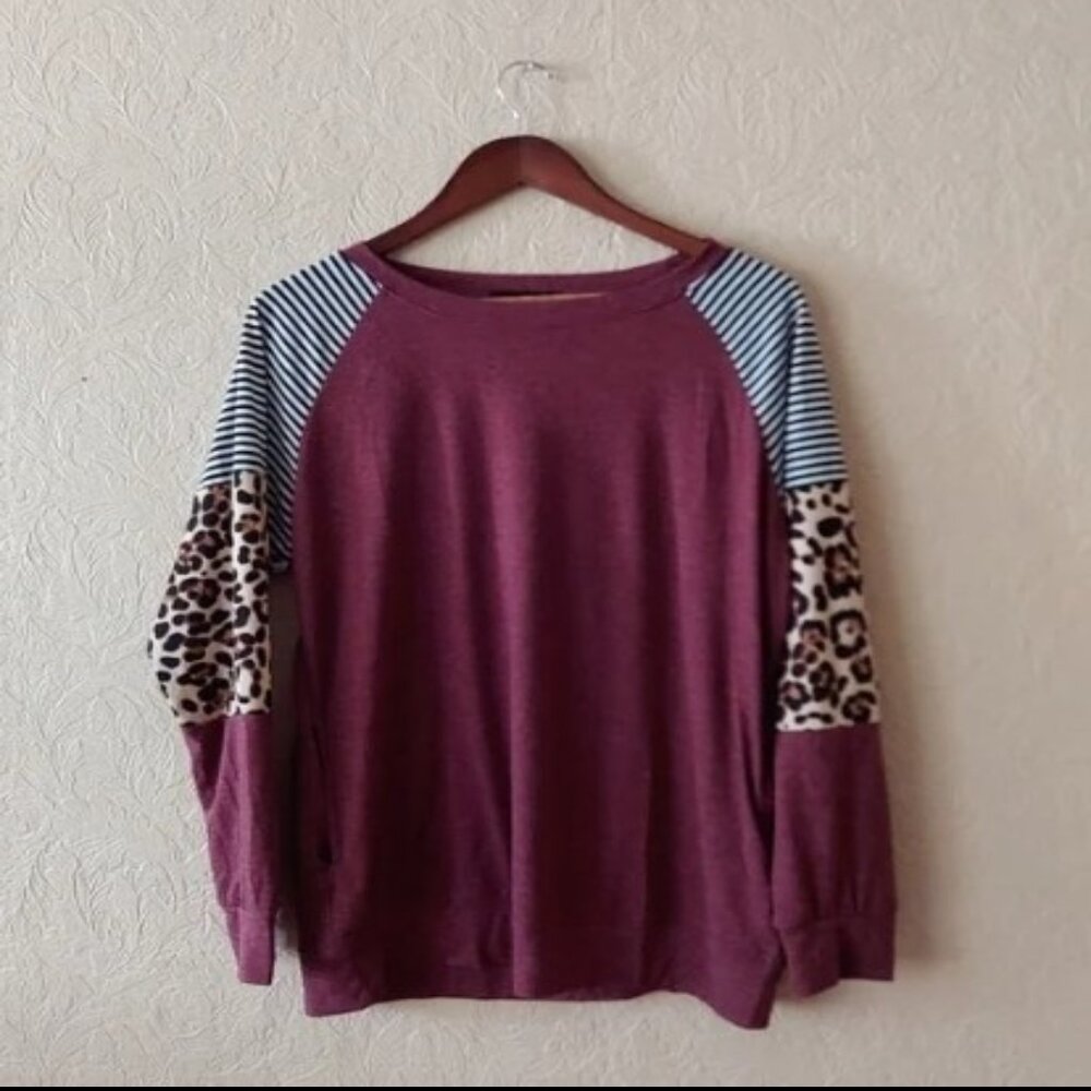 Size S Baseball Style Pullover with burgundy body,  leopard print sleeves